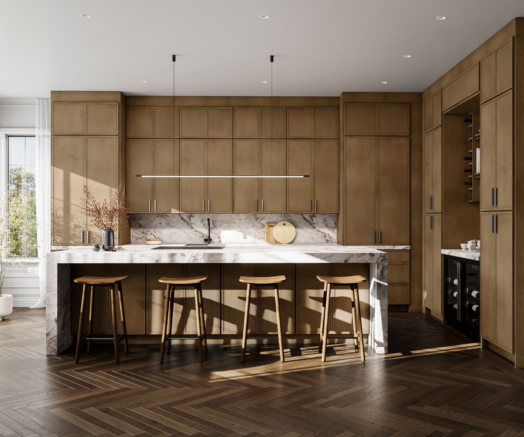 Warm oak kitchen with a marble waterfall island over herringbone floors